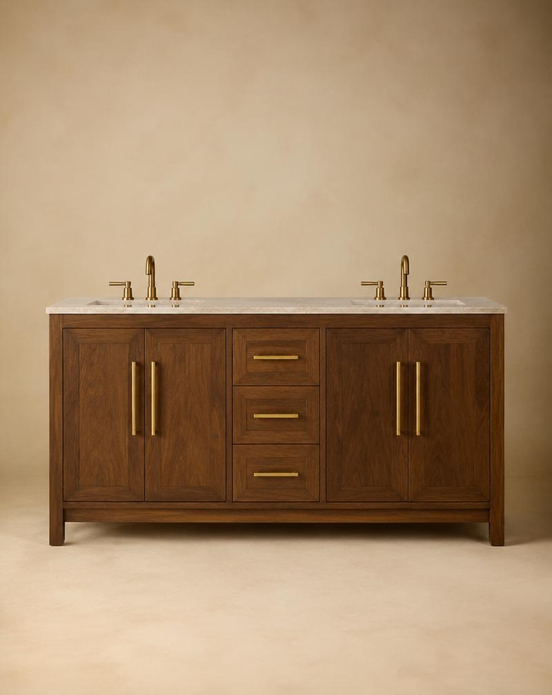A walnut bathroom vanity in warm light